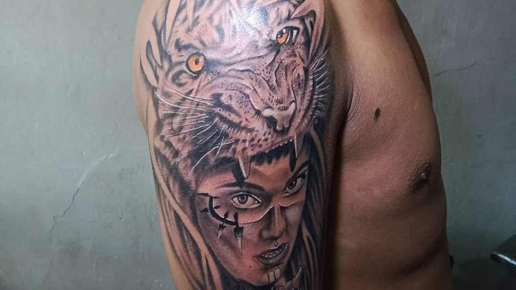 Jauwa Tattoo Studio Dan Barbershop